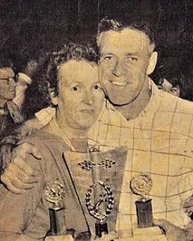 February 26, 1966: Bob Tattersall hands over the Australian Speedcar Grand Prix trophy to Mayfree Freeman at the Sydney Showground.