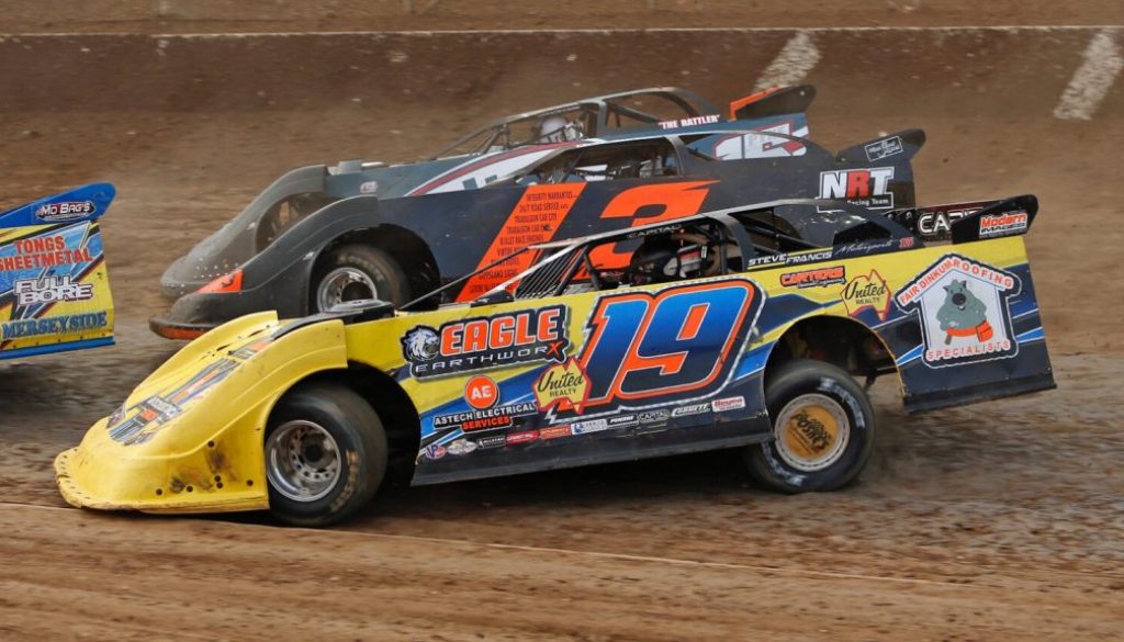 Late-Models-race-three-wide.-Photo-Corey-Gibson