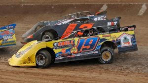 Late-Models-race-three-wide.-Photo-Corey-Gibson